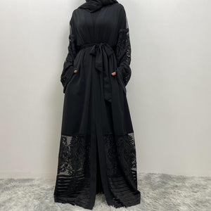 Front view of Arya open abaya in nidha fabric with sheer lace trim and matching belt