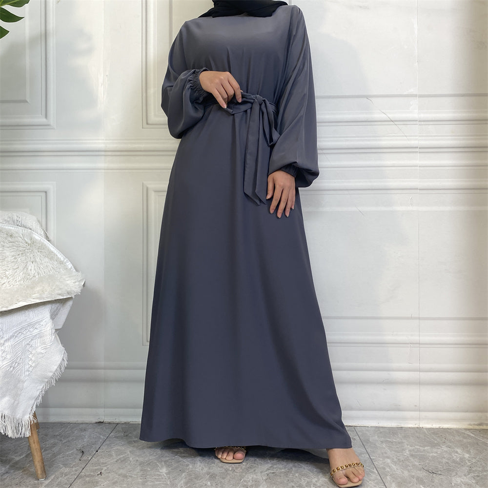 Dina abaya in nidha fabric with loose fit, matching belt and modest flow